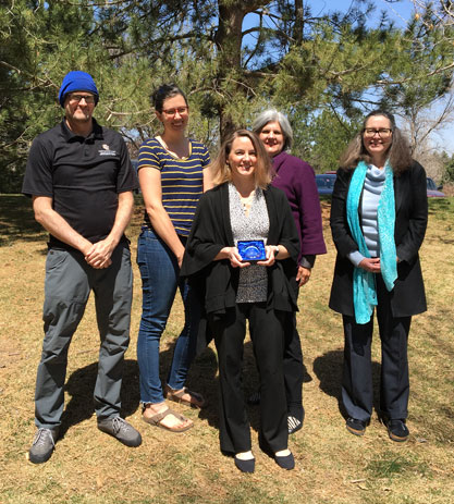 CCML Awards Committee and Kristen DeSanto (center). L to R back row: Ben Harnke, Christi Peterson, Laura Cullerton, and Elizabeth Thoms Charles, Chair, CCML Awards Committee  